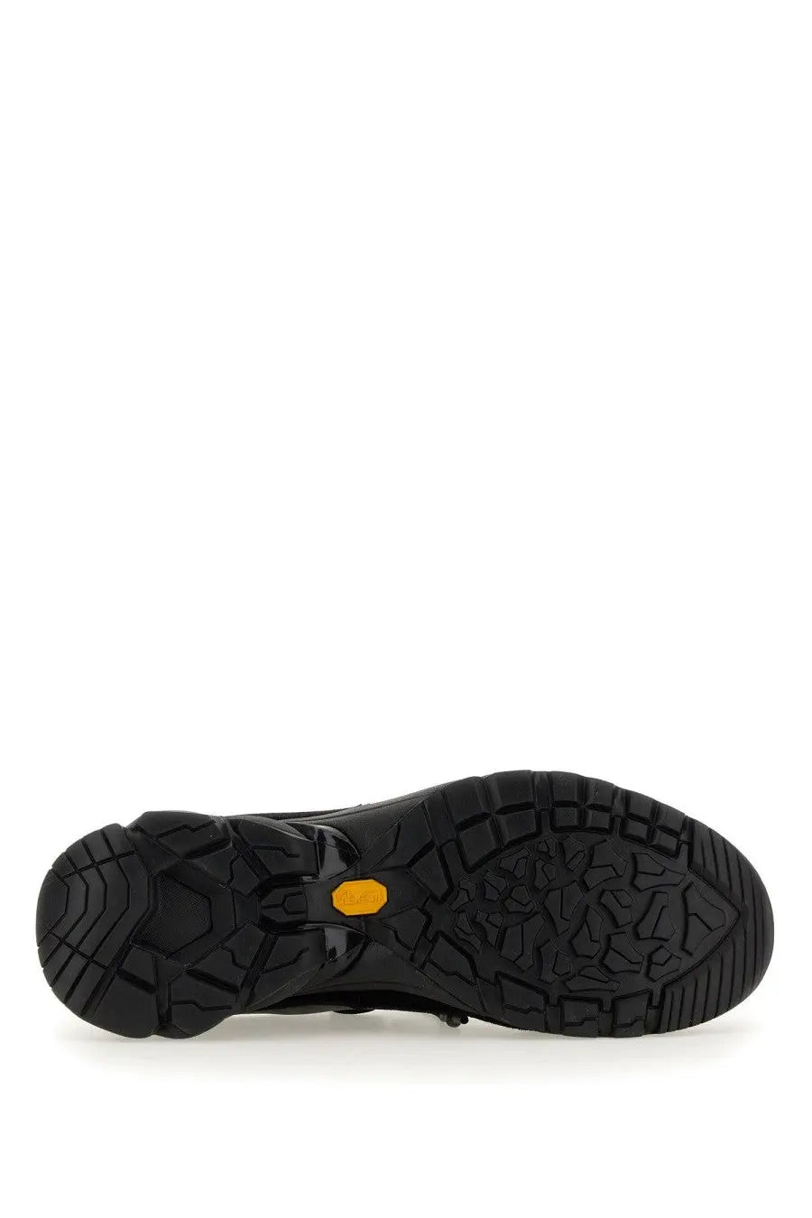 Our Legacy unisex Klove sneaker black showing back side with rugged rubber sole and yellow Vibram logo on heel