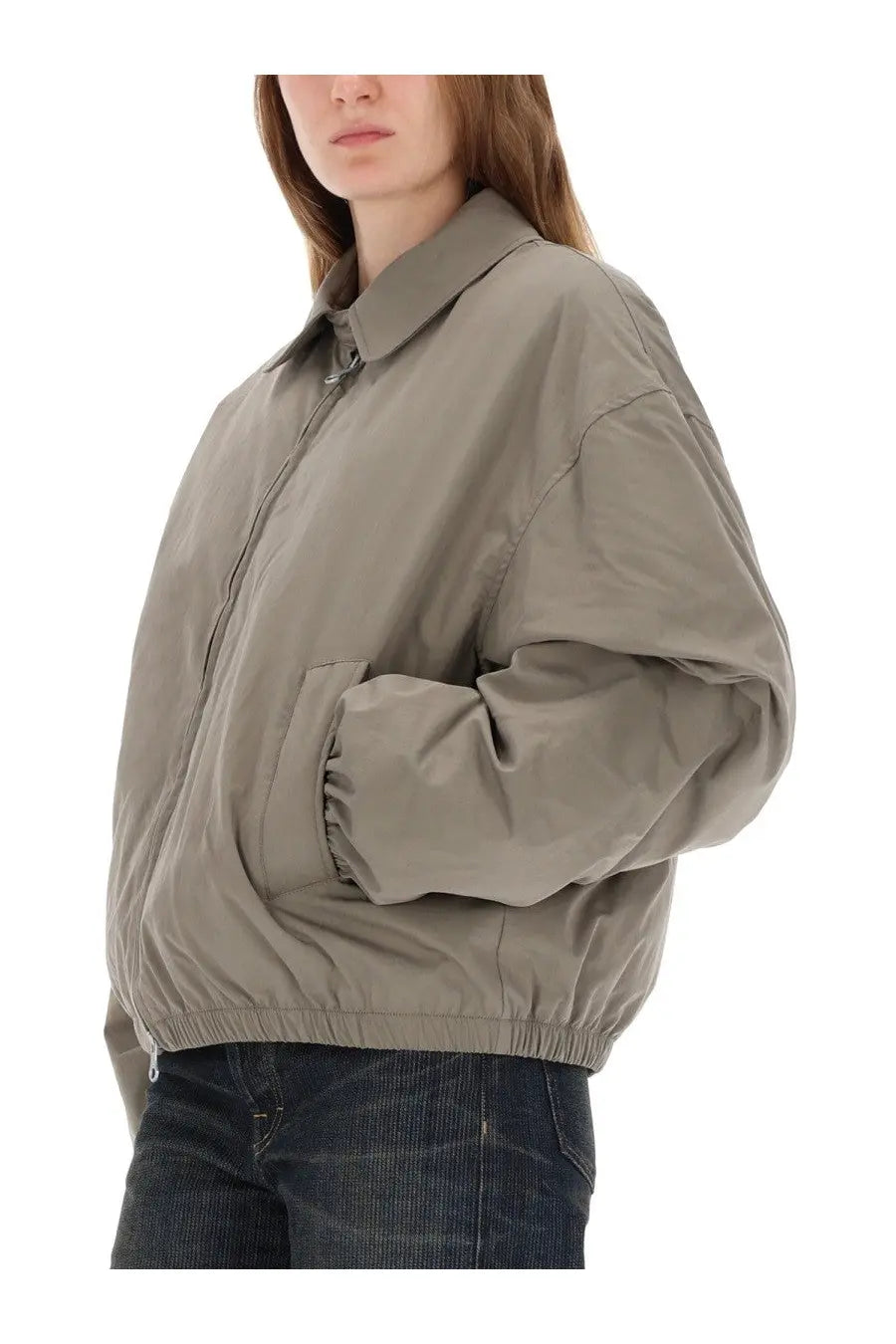 Our legacy women’s cropped avenue puffa jacket black in beige oversized bomber style with relaxed fit and elasticized cuffs