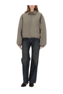 Our legacy women’s cropped avenue puffa jacket black with olive green puffer design collar and front zipper