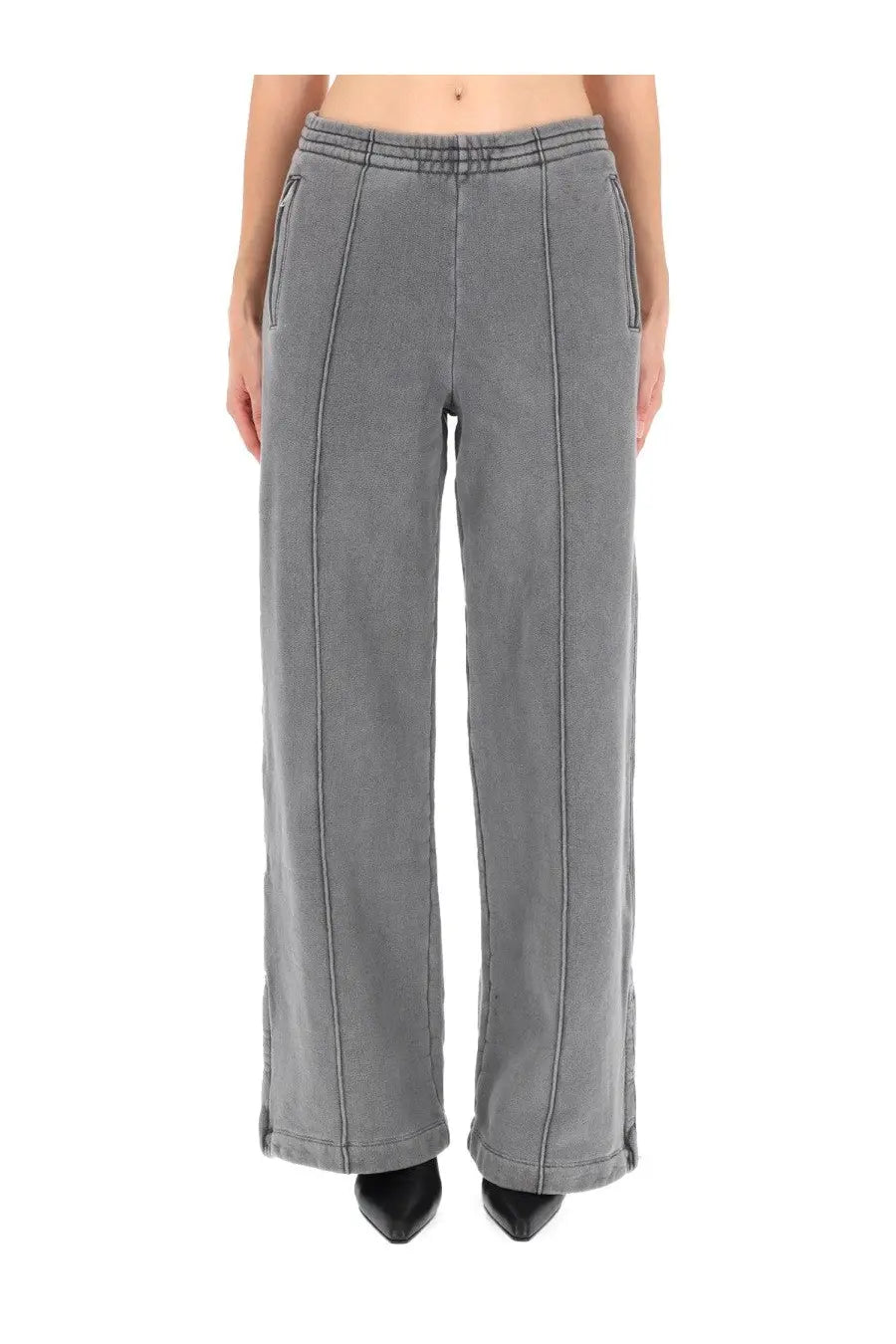 Our Legacy women’s lounge pants black featuring gray wide-leg trousers with relaxed fit vertical seams and side pockets