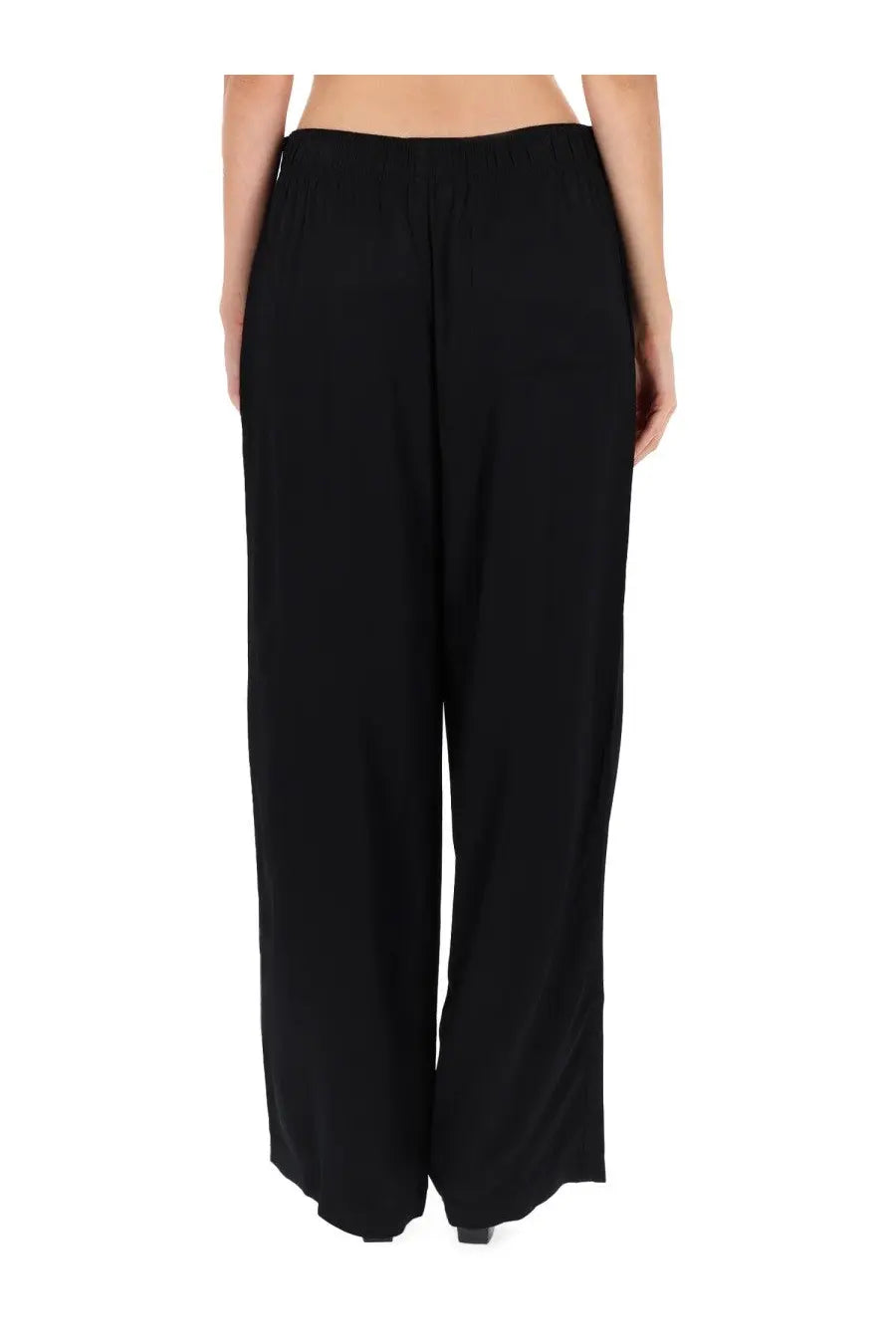 Our Legacy women’s pants robe black smooth flowing fabric wide-leg trousers with elastic waistband front view