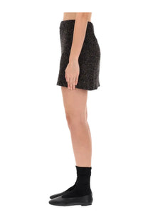 Our Legacy women’s sculpt black textured mini skirt with a flared hemline and multicolor detailing