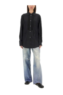 Our legacy women’s black button-up shirt with pleated front and textured sleeves perfect for stylish occasions