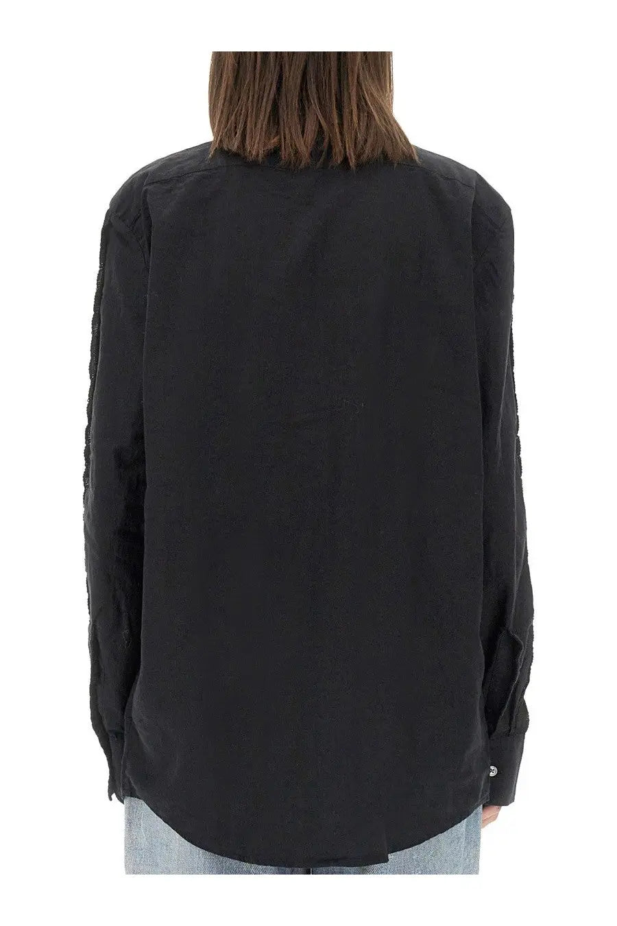 Our Legacy women’s black long-sleeved shirt with subtle textured pattern on sleeves in sincere black color