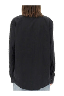 Our Legacy women’s black long-sleeved shirt with subtle textured pattern on sleeves in sincere black color