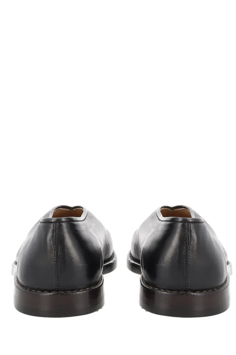 Lemaire men’s black leather flat piped slippers with polished finish and dark brown soles for formal wear