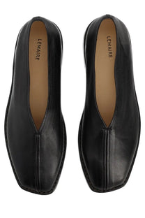 Lemaire men’s flat piped slipper black leather slip-on loafers with sleek minimalist design and subtle stitching details