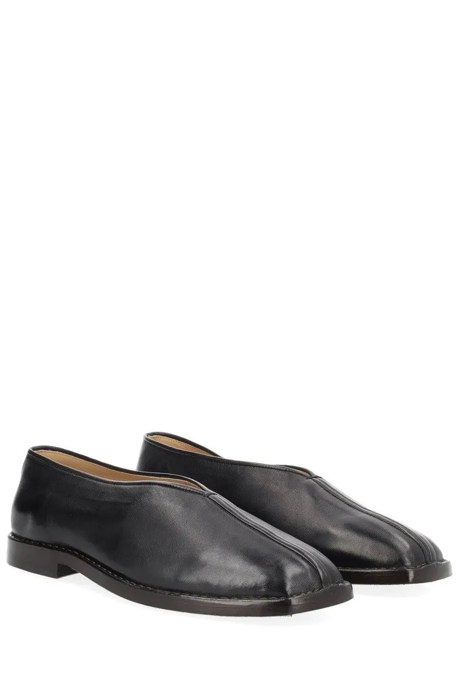 Lemaire men’s black leather slip-on loafers with sleek minimalist design and subtle stitching details