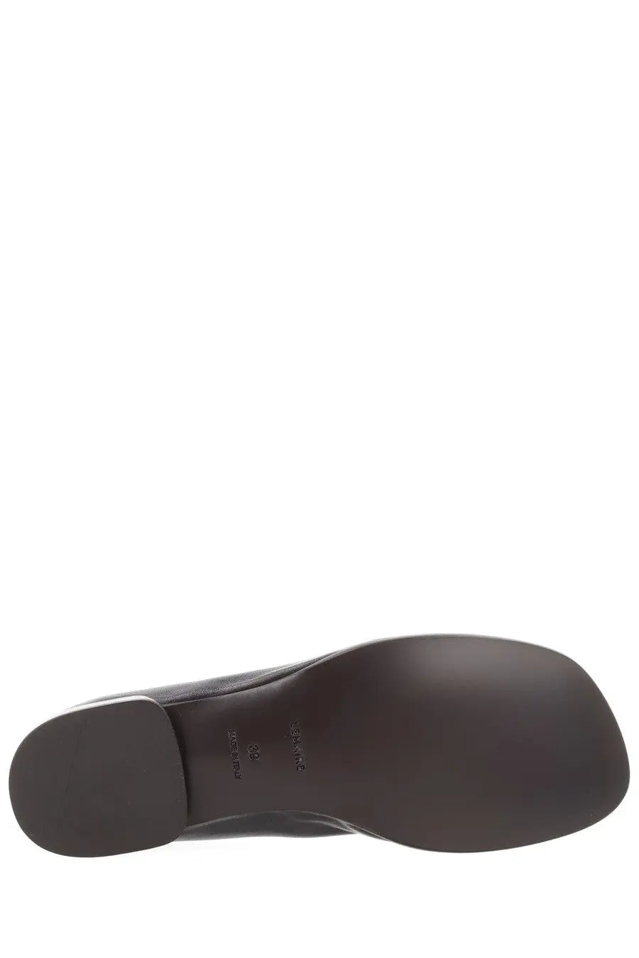 Back side of lemaire women’s ballerina glove in brown leather with smooth sole and subtle embossed branding near heel