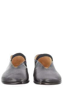 Lemaire women’s ballerina glove brown black leather slip-on mules with sleek minimalist design and tan lining