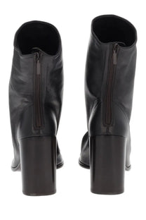 Lemaire women’s glove brown leather ankle boots with chunky heel and zipper closure shown from the back side