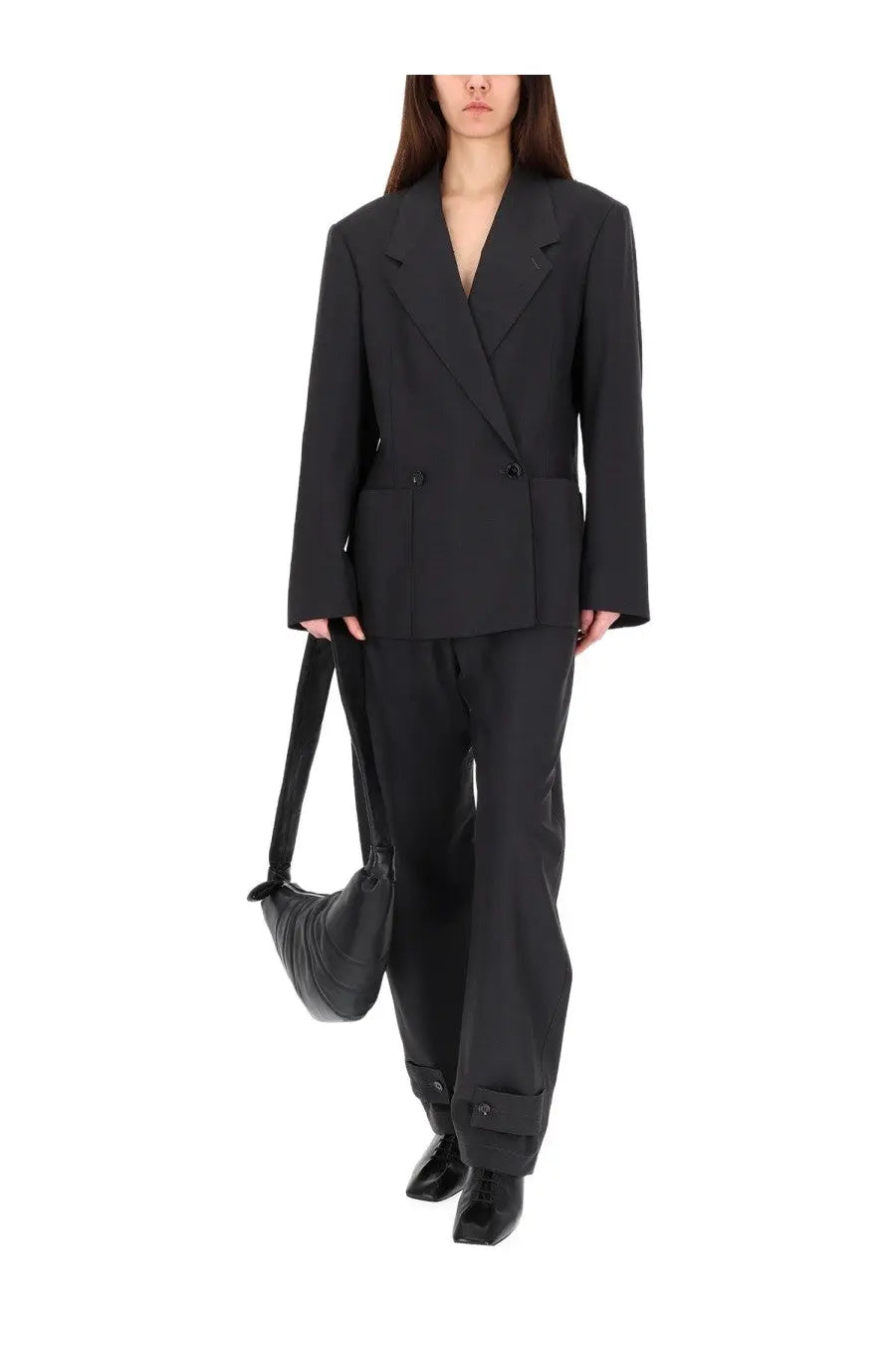 Black tailored blazer with structured shoulders and double breasted front from Lemaire women’s jacket collection