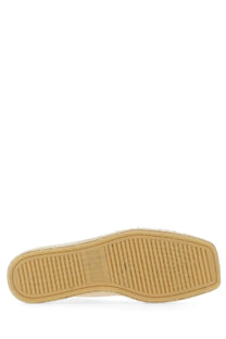 Beige sole of lemaire women’s espadrille linoleum white shoe with textured rubber tread and woven jute edge