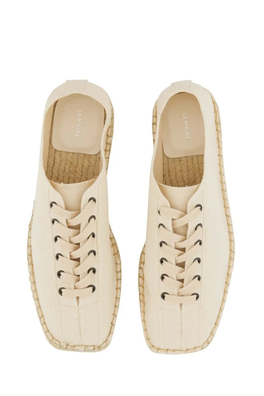Cream-colored lemaire women’s espadrille sneakers with woven jute soles and black eyelets in linoleum white