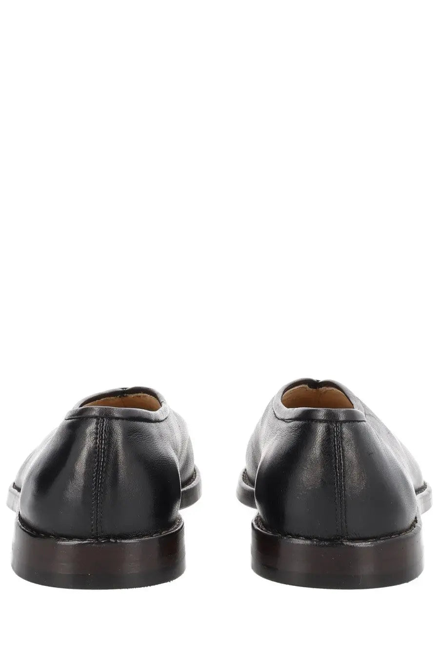 Lemaire women’s flat piped slipper black in black leather with polished finish and dark brown soles front view
