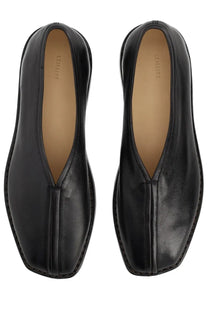 Lemaire women’s black leather slip-on loafers with sleek minimalist design and subtle stitching details