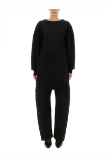 Lemaire women’s black oversized long-sleeved shirt with relaxed fit and subtle side slits