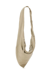 Beige leather shoulder bag with long twisted strap and zipper closure from lemaire women’s small scarf bag collection
