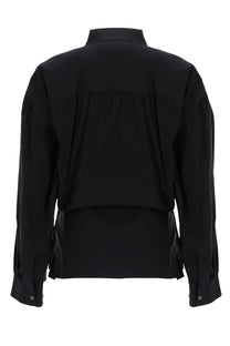 Black long-sleeved Lemaire women’s shirt with structured collar and layered back design shown from the back side