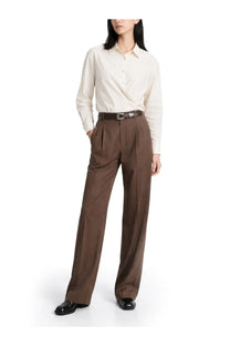 Brown pleated trousers with tailored fit and subtle texture paired with lemaire womens straight collar twisted white shirt