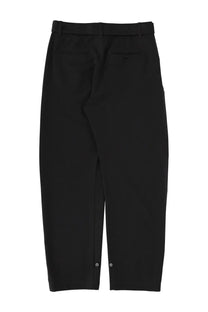 Lemaire women’s tailored grey trousers with a sleek modern cut and subtle button details at the cuffs