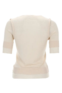 Cream-colored knit sweater with ribbed cuffs and hem in a relaxed fit from Lemaire women’s trompe loeil viscose and silk top beige