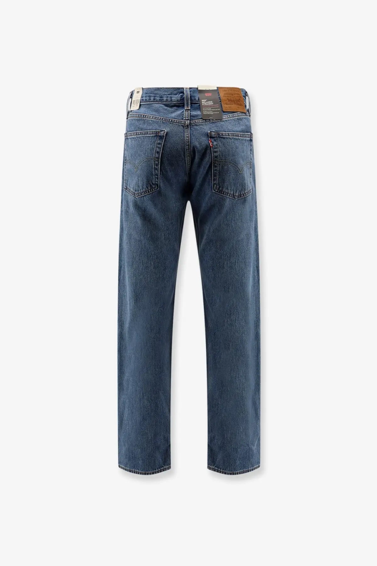 Levi’s men’s relaxed straight jeans in dark blue denim with classic five-pocket design and brown leather patch at waistband