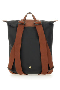 Longchamp women’s backpack le pliage original medium in black with brown leather straps and canvas body shown from back