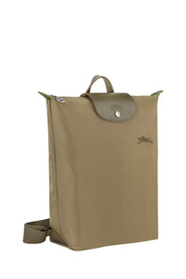 Longchamp women’s le pliage original medium green backpack with tan textured leather flap and subtle embroidered logo
