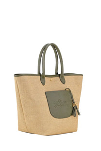 Beige woven straw Longchamp women’s basket bag with olive green leather handles and embossed horse logo pocket