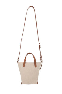 Beige canvas tote bag with brown leather handles and shoulder strap from longchamp borsa complice collection