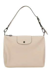 Beige Longchamp Women’s borsa hobo LE Pliage Xtra handbag with sleek minimalist design and black hardware accents