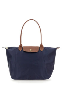 Navy blue longchamp le pliage large tote bag with brown leather handles and flap for women