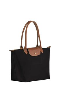 Longchamp women’s borsa le pliage medium black tote bag with tan leather handles and gold-tone hardware