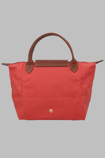 Longchamp women’s borsa le pliage small red handbag with brown leather handles and trim