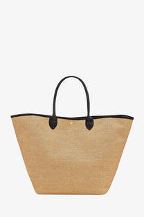 Beige woven straw tote bag with black leather handles and trim longchamp women’s le panier pliage raffia and leather bag black