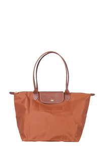 Tan longchamp le pliage large tote bag with brown leather handles and matching flap closure for women