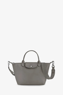 Gray longchamp le pliage leather shoulder bag with sleek structured design and matching shoulder strap