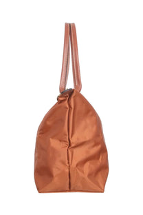 Longchamp women’s le pliage medium bag brown tan leather shoulder bag with sleek minimalist design and matching handles