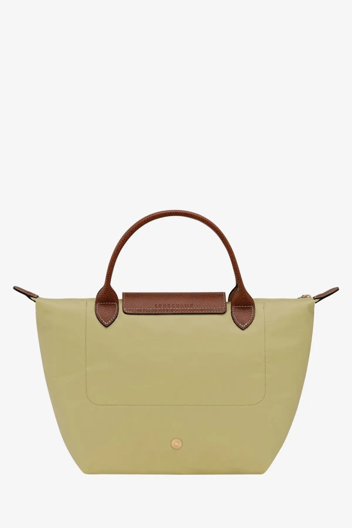A pale green Longchamp women’s Le Pliage nylon tote bag with brown leather handles and flap