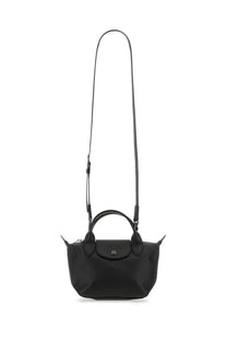 Longchamp women’s le pliage xtra mini bag black with sleek structured design and matching adjustable shoulder strap