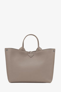 Longchamp women’s le roseau beige textured leather tote bag with rounded handles and triangular flap closure