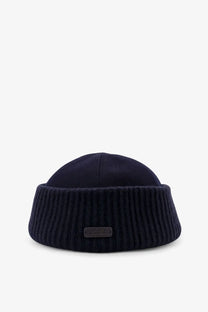Dark navy ribbed knit cashmere beanie with folded brim and leather tag by Loro Piana men’s Brando hat blue