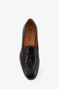 Loro Piana men’s serge tassel leather loafers in black with polished finish and tan leather lining