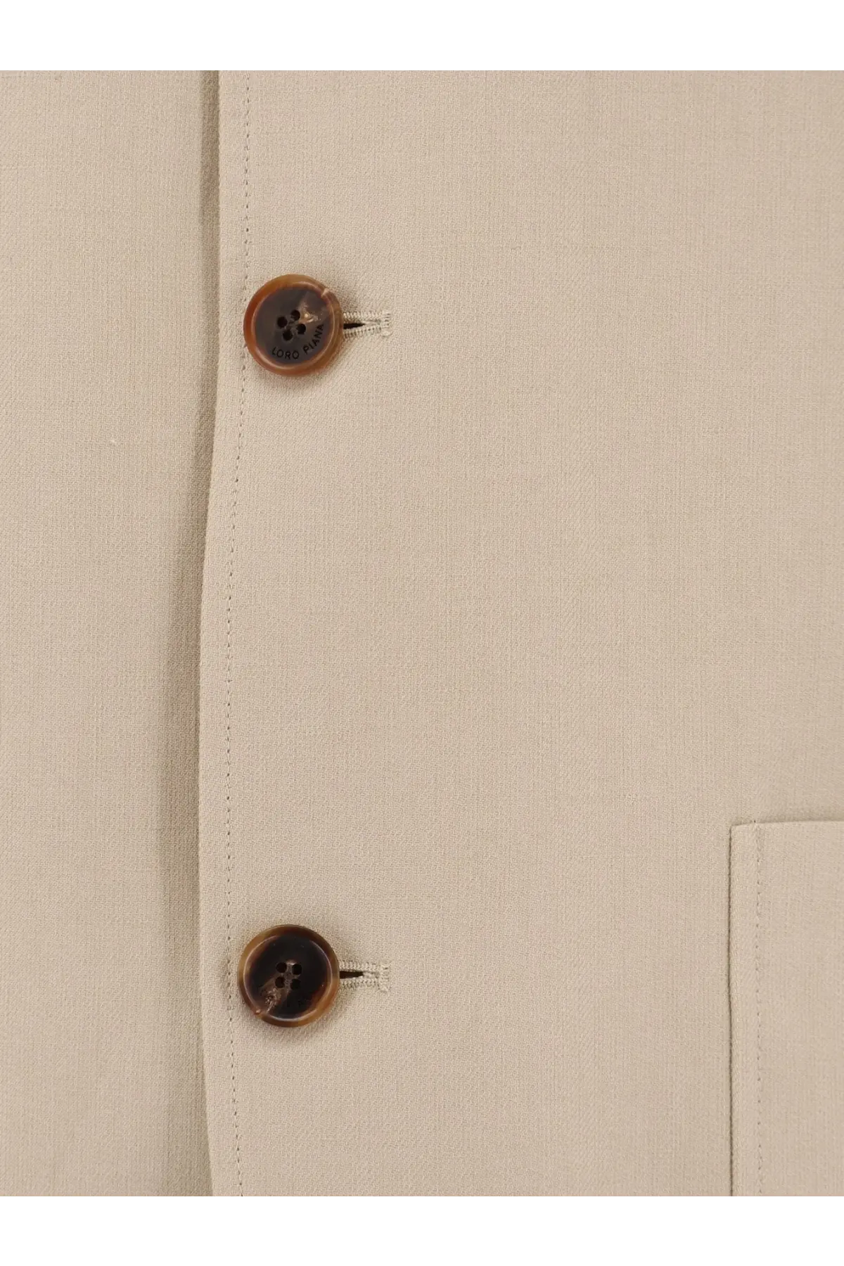 Beige linen shirt with tortoiseshell buttons paired with Loro Piana men’s spagna linen blazer orange