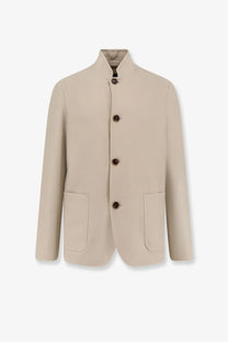 Beige wool-blend blazer with mandarin collar and dark brown buttons by Loro Piana men’s Spagna linen blazer orange