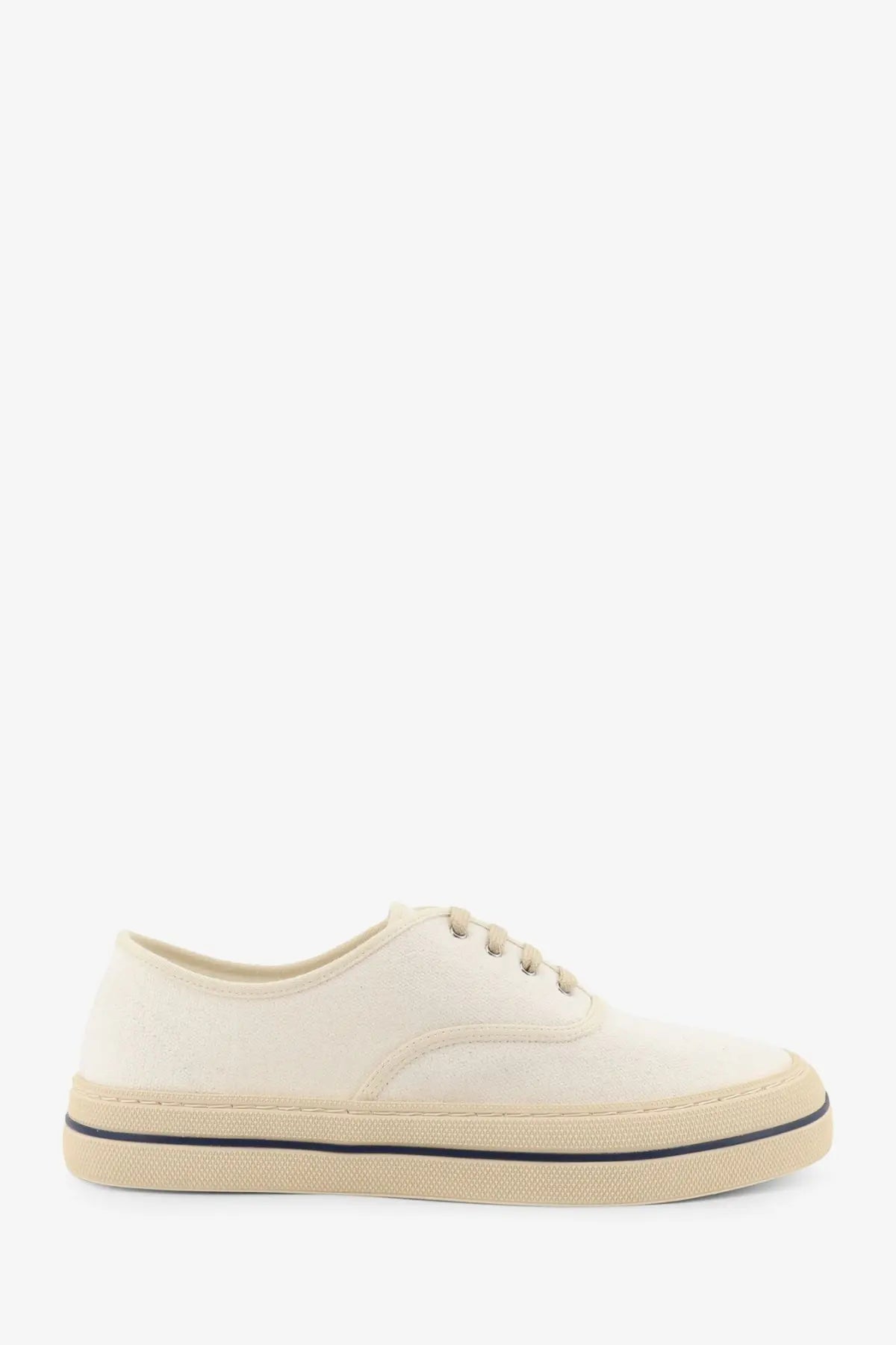 Loro Piana women’s white canvas sneakers with cream color, beige rubber sole, and black stitching along the edge