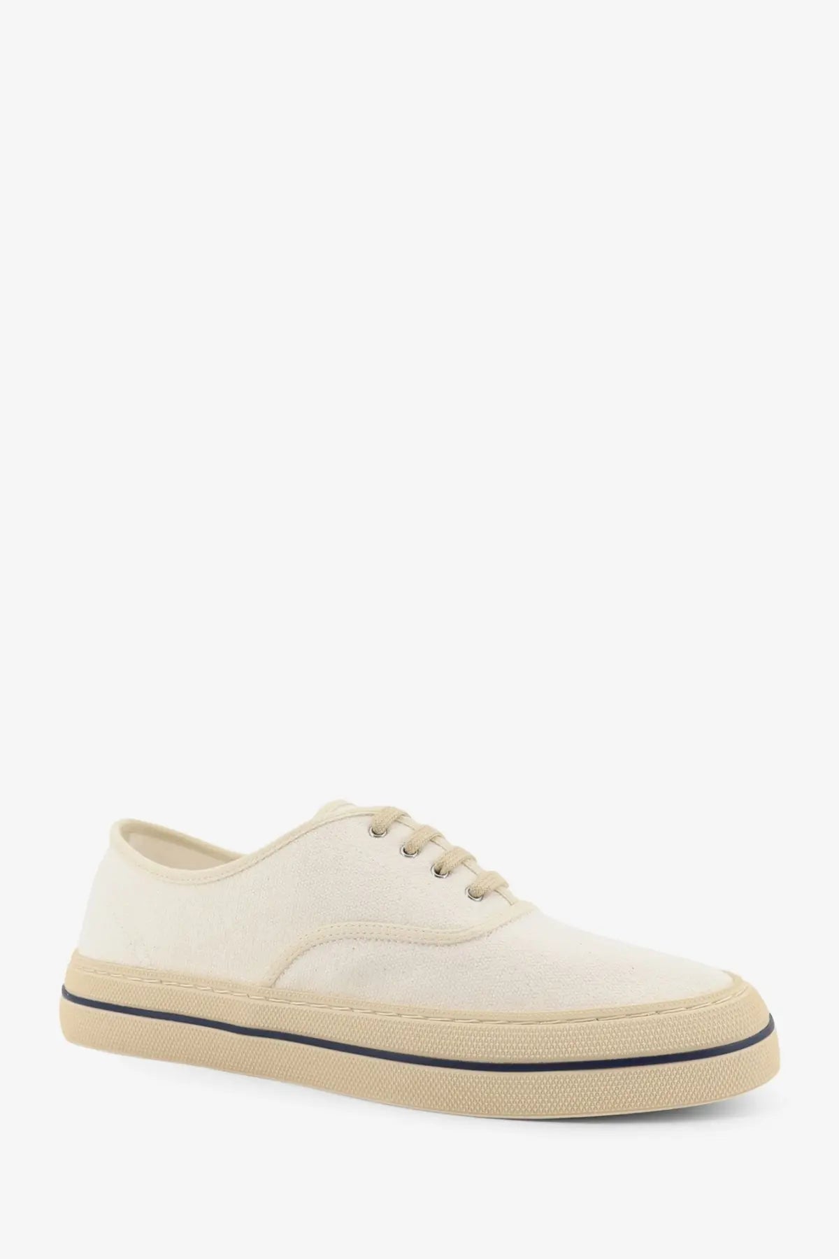 Loro Piana women’s cream canvas low-top sneaker with beige rubber sole and black stitching detail