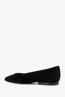 Loro Piana women’s Primula black suede ballet flat with low heel and rounded toe shown from the back side