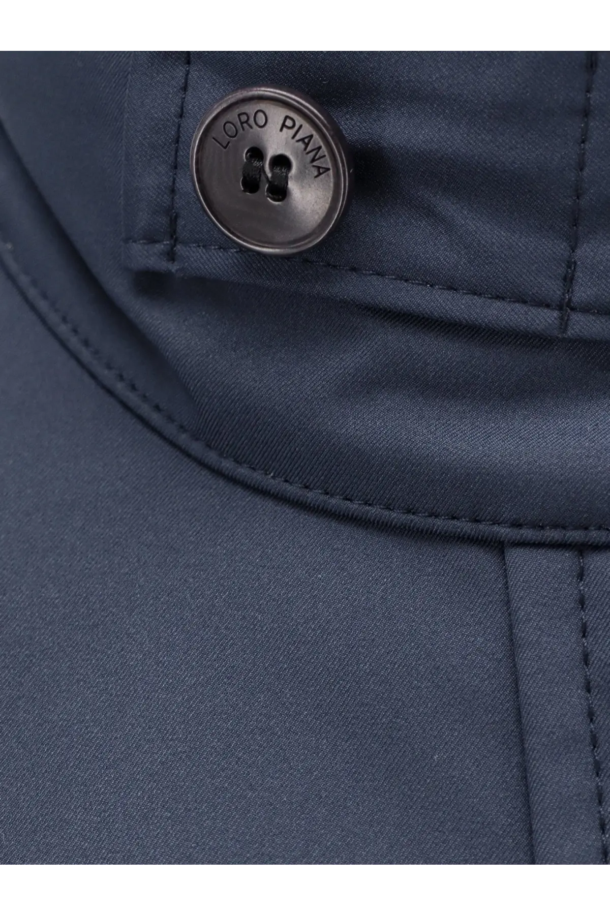 Dark blue loro piana women’s traveller windmate jacket fabric with metallic button engraved with loro piana